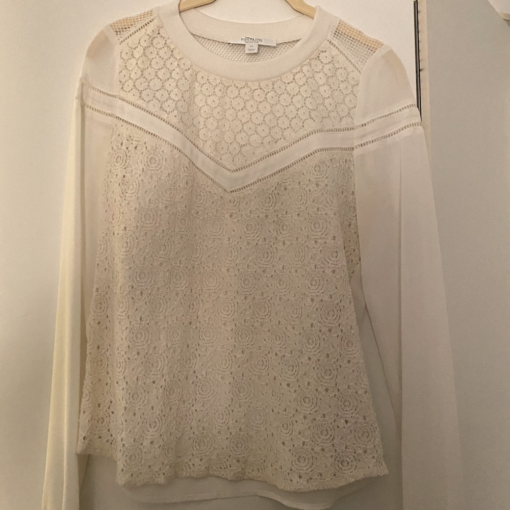 White blouse with flower details